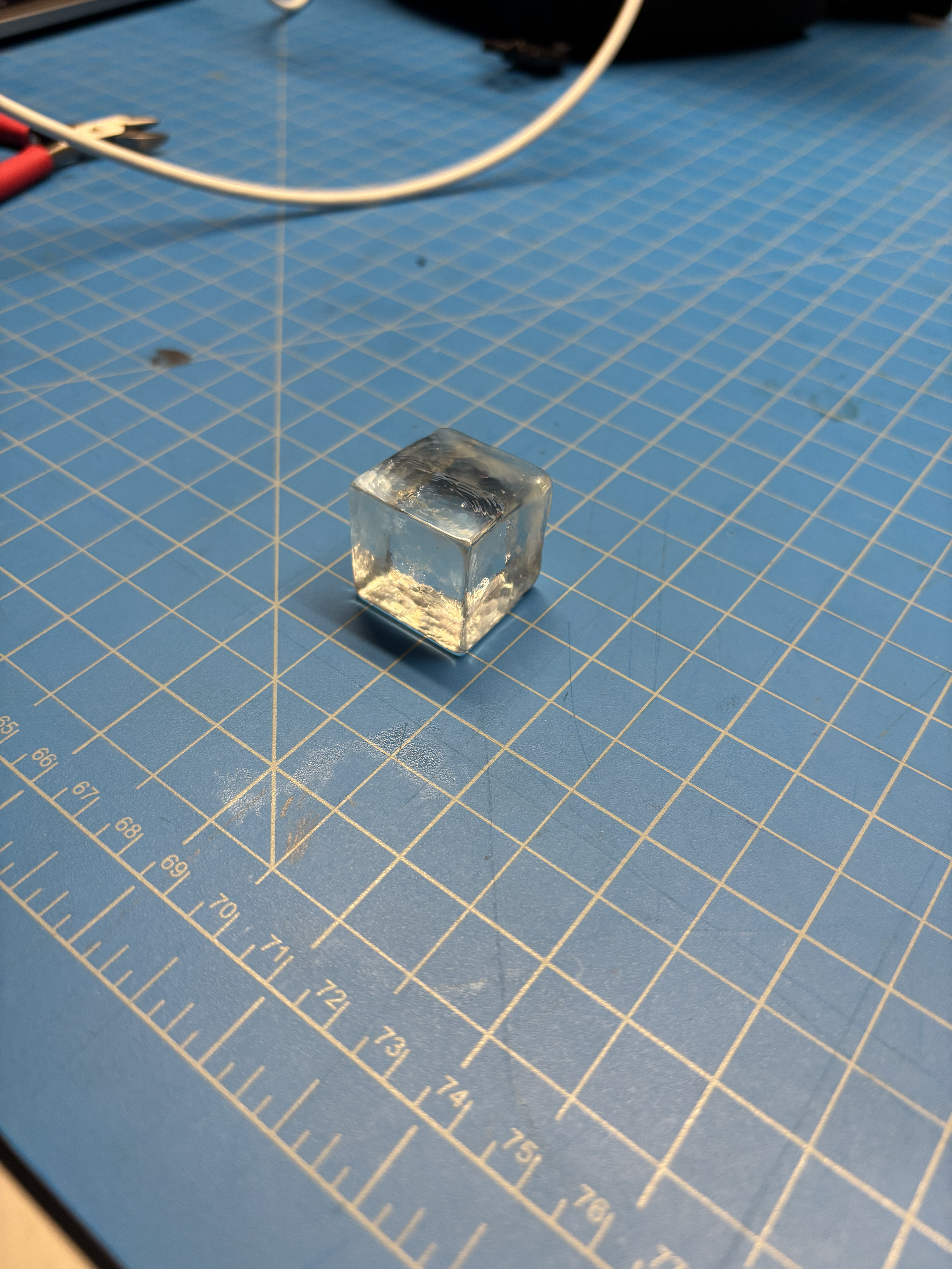 Transparent Hard Resin

<br> Colour: Clear and glossy, slightly reflective under light.

<br> Plasticity vs Rigidity: Rigid and solid, not easily bent but can be shaped when heated.

<br> Surface Texture: Smooth and polished, with a glass-like shine.